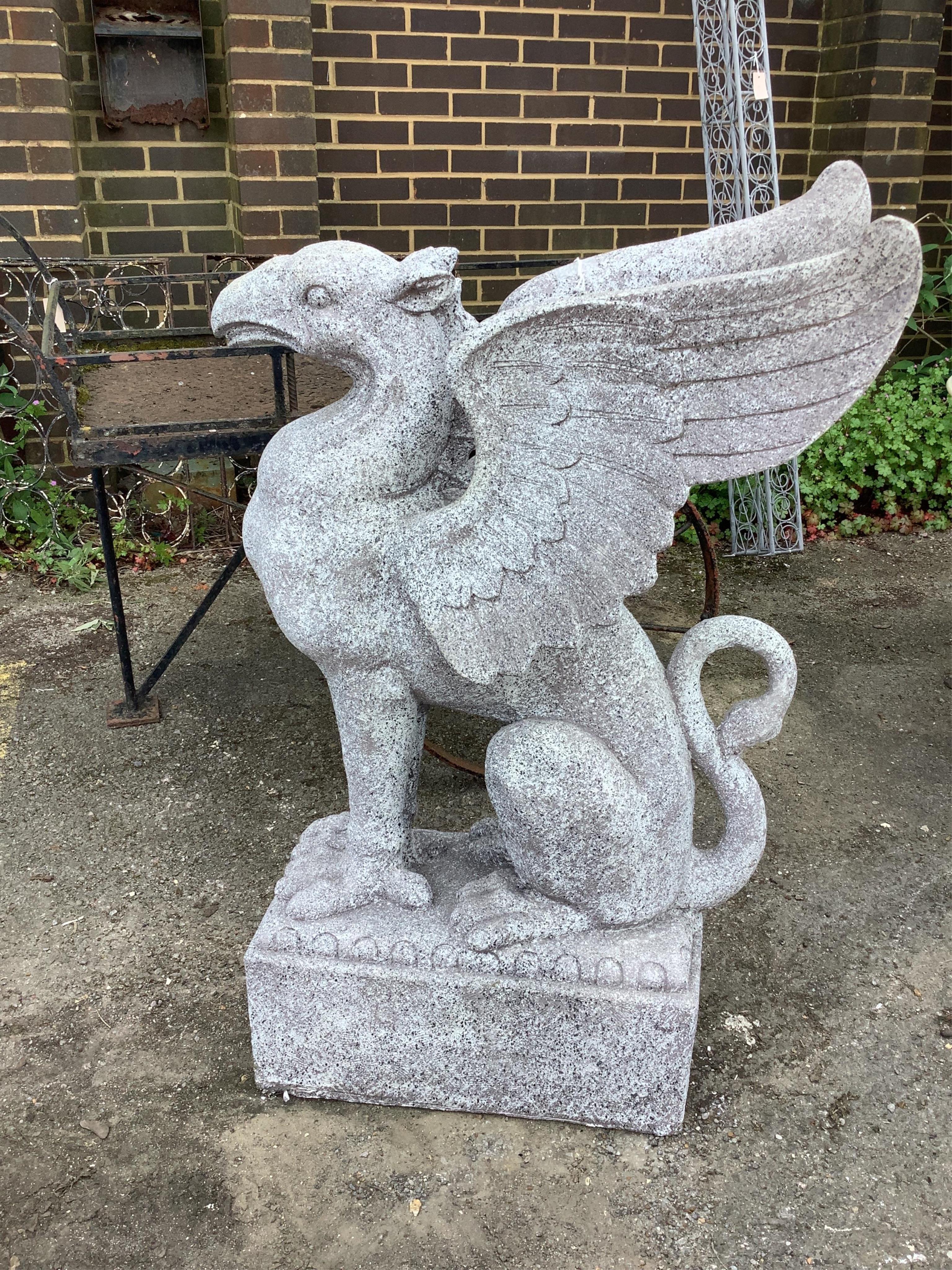 A Fibreclay griffon garden ornament, height 108cm